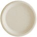 A round white Tellus bagasse plate with a plain rim.
