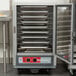 Metro half-size holding cabinet with trays inside.