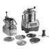 AvaMix Goliath food processor with stainless steel bowl, continuous feed, and 4 discs on a white background.