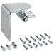 A metal bracket with screws and nuts on a table.