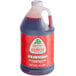 A Jarritos jug of strawberry slushy concentrate.