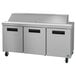 A stainless steel Hoshizaki sandwich top prep refrigerator with 3 doors.