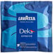 A blue package of Lavazza Dek Decaf single serve espresso pods with a blue and white label.