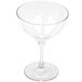 A GET Social Club clear Tritan plastic martini glass with a stem.