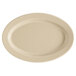 A beige oval platter with a speckled surface.