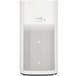 A white rectangular Guardian Technologies Germ Guardian air purifier with black dots and holes.