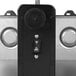 A close-up of a black switch on a Bunn BrewWISE Dual Brewer.