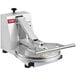 A white Estella dual-heat tortilla press machine with a black handle.