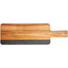 An Acacia wood serving board with a slate insert and a handle.