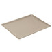 A rectangular taupe Cambro dietary tray with a plastic handle.