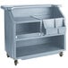 A slate blue plastic portable bar with two shelves.