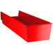 A red plastic Regency shelf bin with two compartments.