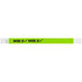 A green Tyvek wristband with white and black text reading "OVER 21"