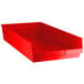 A red plastic Regency shelf bin with a white background.