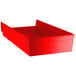 A red plastic Regency shelf bin with a handle.