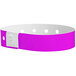 A purple wristband with white dots.