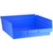 A blue plastic Regency shelf bin.