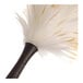 A lambswool duster with a black handle and soft, fluffy white fibers.