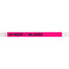 A neon pink Carnival King wristband with the words "ALL ACCESS" in black.