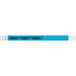 A blue rectangular Tyvek wristband with black text reading "STAFF" and a star.