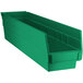 a green plastic bin with a white background