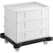 A white plastic Baker's Mark dough proofing bin on a white plastic cart.