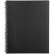 a black notebook with spiral bound