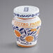 A jar of Fabbri Candied Ginger in syrup with a white lid.