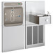 An Elkay stainless steel chilled hands-free bottle filling station over a water fountain.