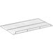 A metal rack with a wire grid on it, the Avantco Lower Shelf for Bakery Display Cases.