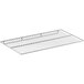 A stainless steel wire shelf for a bakery display case.