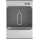 An Elkay stainless steel surface mount bottle filling station with a bottle of water in the middle.