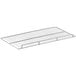 An Avantco metal shelf with a wire grid on it.