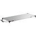 A white rectangular stainless steel Metro countertop shelf warmer with a power cord.