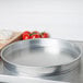 An American Metalcraft aluminum cake pan on a counter.