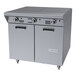 A stainless steel commercial gas range with two hot top sections, three control knobs, and a double-door storage base.