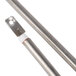 A pair of stainless steel rods connected by white plastic.