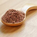a spoon full of ground powder