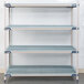 A MetroMax metal grid shelf with wheels.