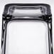 A clear glass block with a square base, the Libbey Cube Votive Holder.