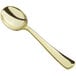 A Visions gold plastic soup spoon with a handle.