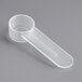 a close-up of a plastic measuring cup