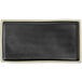 An Acopa matte black rectangular melamine tray with an ivory border.