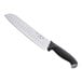 A Schraf Santoku knife with a black TPRgrip handle.