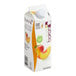 A white carton of Les Vergers Boiron Peach 100% Fruit Puree with a label and a peach on top.