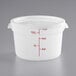 A translucent white plastic Choice food storage container with measurements and red writing on it.