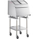 A stainless steel ServIt chip warmer on a mobile stand with a lid.