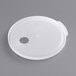 A white plastic round lid with a hole in the center.