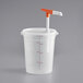 A white plastic container with an orange Choice pump handle.