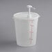 A white plastic container with a pump.